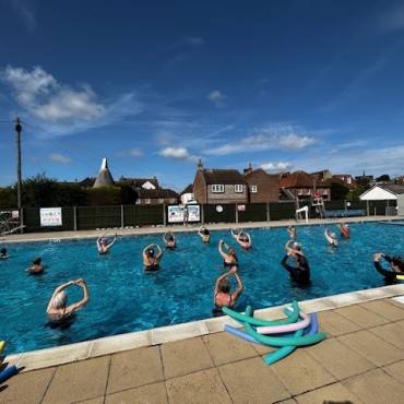 An exercise class being held in Arundel Lido's outdoor pool.